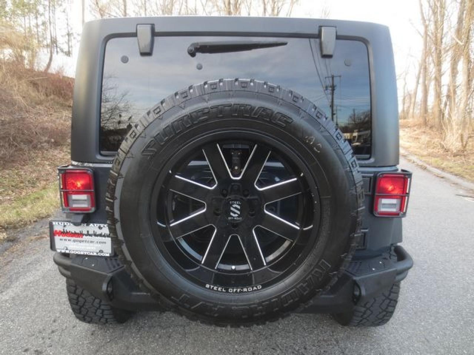 2016 Gray /Black Jeep Wrangler Unlimited Sport (1C4BJWDG6GL) with an 3.6 L v6 engine, 6 Speed Manual transmission, located at 270 US Route 6, Mahopac, NY, 10541, (845) 621-0895, 41.349022, -73.755280 - Photo #5